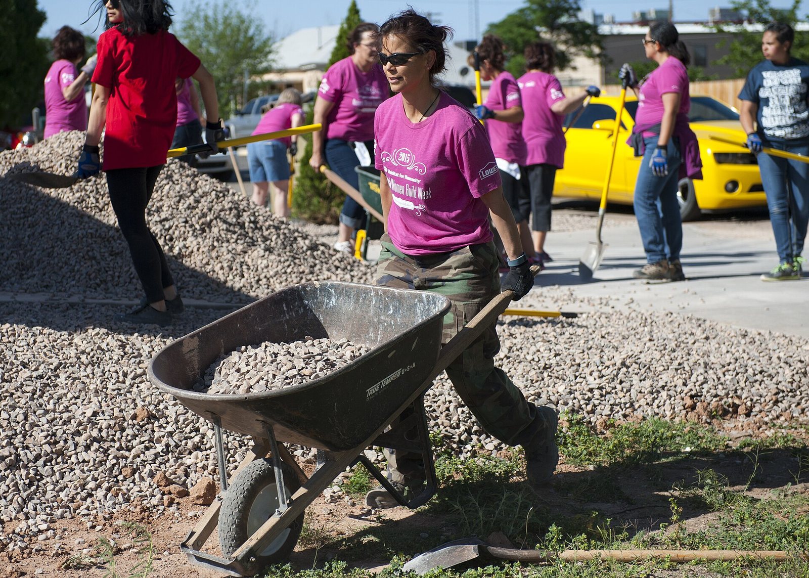 Women volunteers work at a Habitat for Humanity home site in Alamogordo.